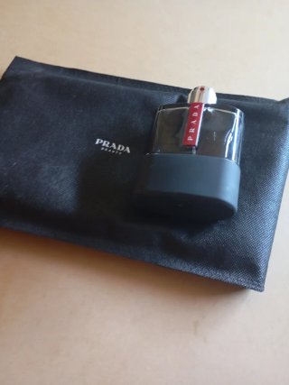 Conjunto Neceser Prada Ocean y frasco vacío Carbon