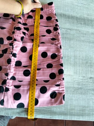 Falda Stradivarius rosa lunares XS