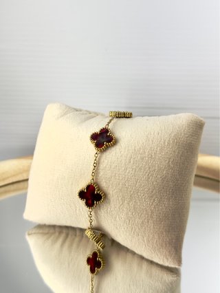 Bracciale con quadrifogli rossi e oro