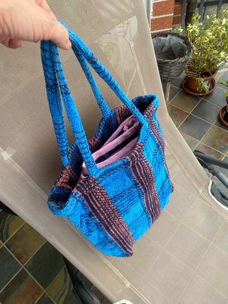 Telo mare e borsa spugna a quadri