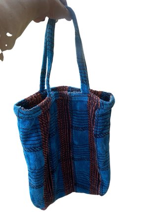 Telo mare e borsa spugna a quadri