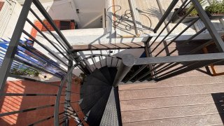 Escalera caracol metálica