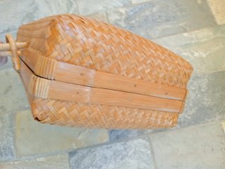 Valigia vintage in rattan midollino intrecciato