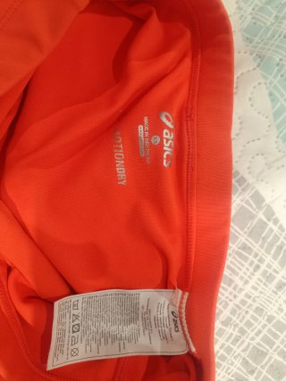 Falda deportiva Asics naranja prácticamente sin us