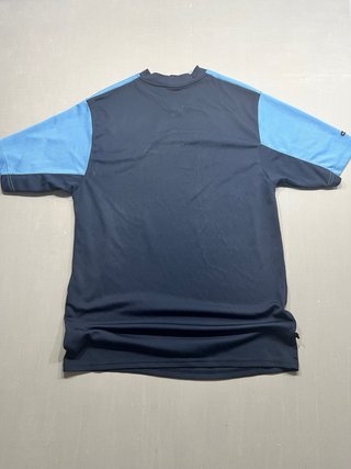 Camiseta Nike azul y blanca