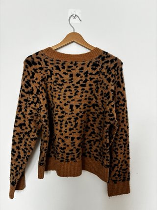 Jersey leopardo marrón y negro