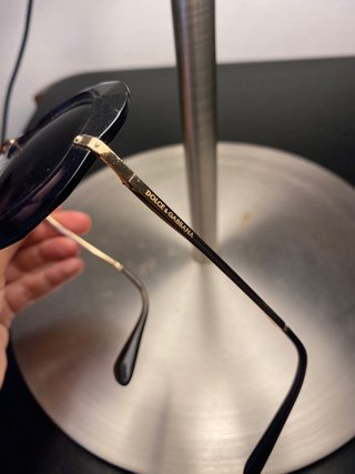 Occhiali da sole rotondi neri e oro Usati