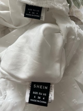 Conjunto falda pantalón y blusa blanco