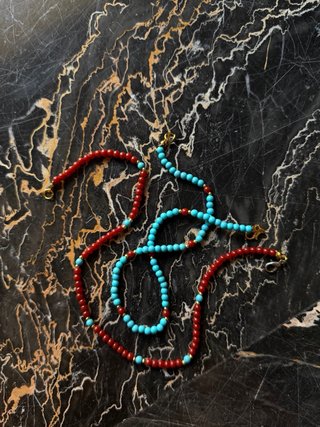 Set collane perle rosse e turchesi