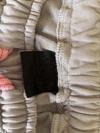 Syna World Shorts Gris y Rosa