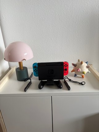 Nintendo Switch + Custodia + Nintendo Switch Sport.