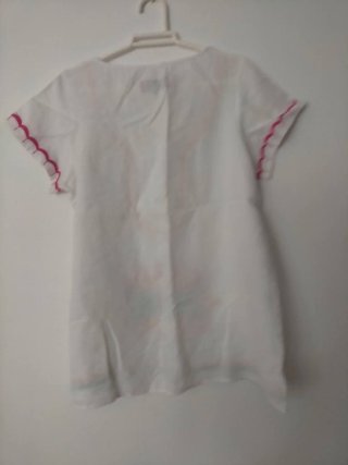 Camisa o blusa bordada blanca y naranja