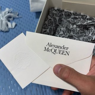 Sneakers Alexander McQueen nere con cristalli