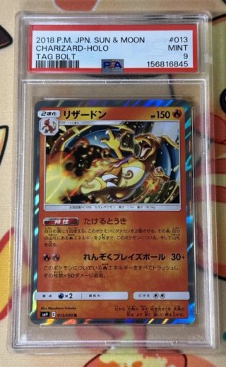 Carta Pokémon Charizard Holo Tag Bolt 2018