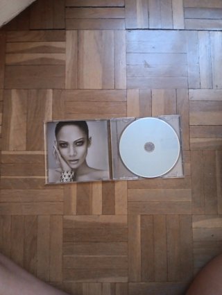 CD Jennifer Lopez - Como Ama Una Mujer