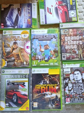Xbox 360 slim con zaino, alimentatore e giochi