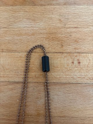 Collana con ciondoli floreali bronzo