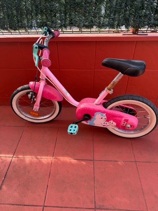 Bicicleta infantil Decathlon 14 con ruedines