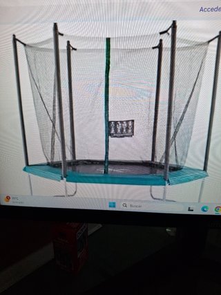 Cama elástica con red de seguridad