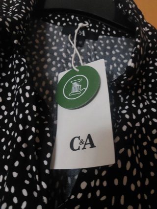 Vestido C&A negro lunares blanco sin mangas