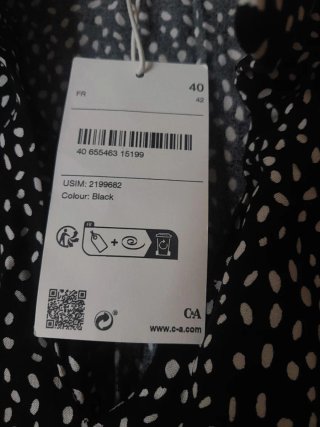 Vestido C&A negro lunares blanco sin mangas