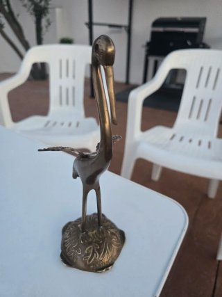 Figuras de bronce: Garza y Justicia