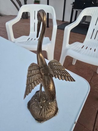 Figuras de bronce: Garza y Justicia