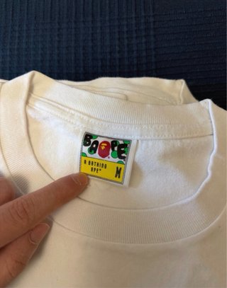 T-shirt Bape A Bathing Ape dourada e branca