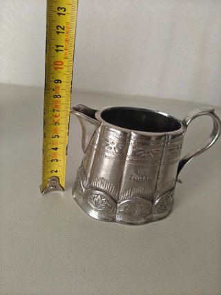 Bricco in metallo argentato