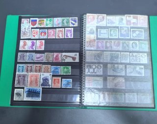 Álbum sellos de varios países (mas de 200 piezas)