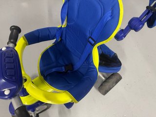 Triciclo evolutivo azul y amarillo