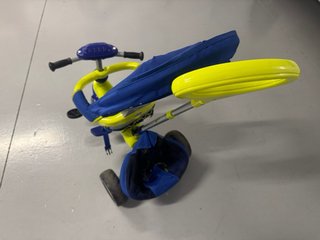 Triciclo evolutivo azul y amarillo