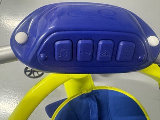 Triciclo evolutivo azul y amarillo
