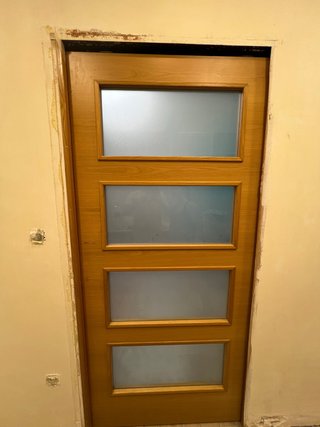 Hoja de puerta corredera con cristal