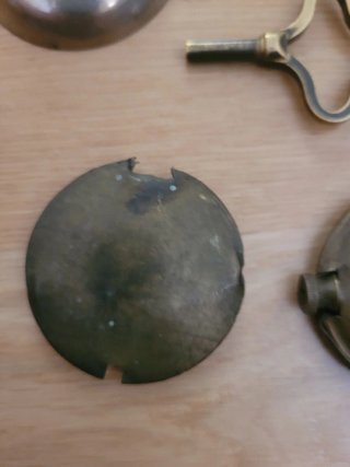 Piezas de reloj antiguas