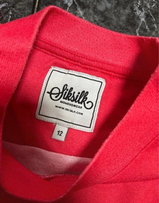 Camiseta SikSilk degradado naranja y rosa