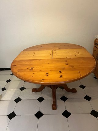 Mesa de comedor redonda de madera