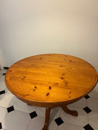 Mesa de comedor redonda de madera