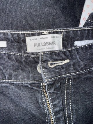 Pantalones vaqueros negros con costuras blancas