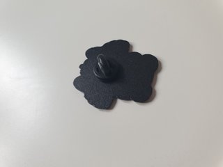 Pin de pompompurin con disfraz de león