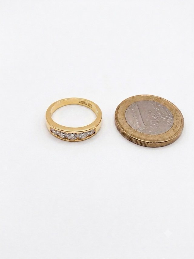 Anillo oro 18k Diamantes Peso:3,74gr talla 8