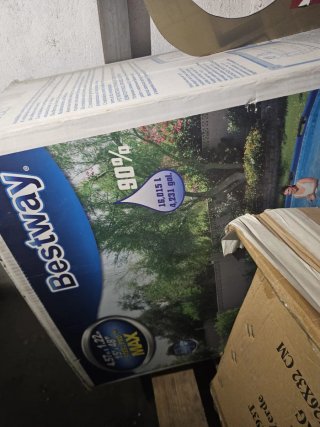 Piscina desmontable azul y blanca con depuradora