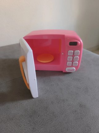 Microondas de juguete rosa