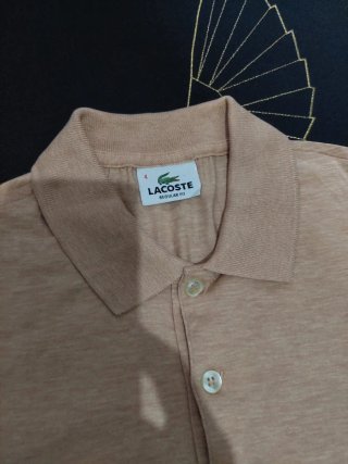 Camisa Polo Lacoste naranja pastel