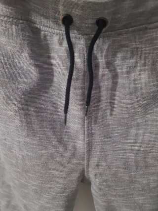 Chándal gris con cremalleras