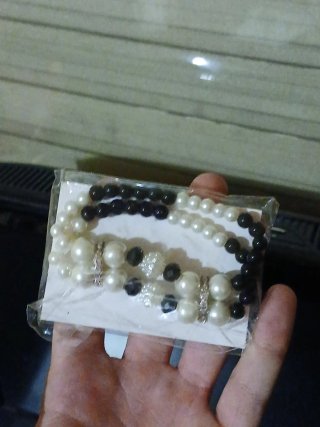 Conjunto de pulsera y pendientes