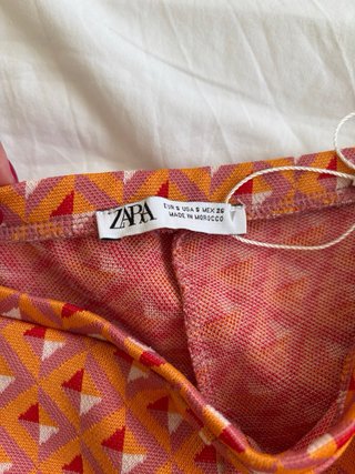 Pantalón Zara acampanado estampado S