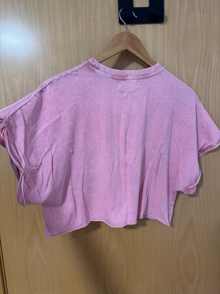 Camiseta rosa corta con bolsillo