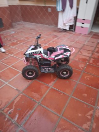 Quad Eléctrico  Rosa con Cargador costo 600