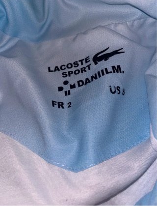 Conjunto deportivo Lacoste azul y blanco